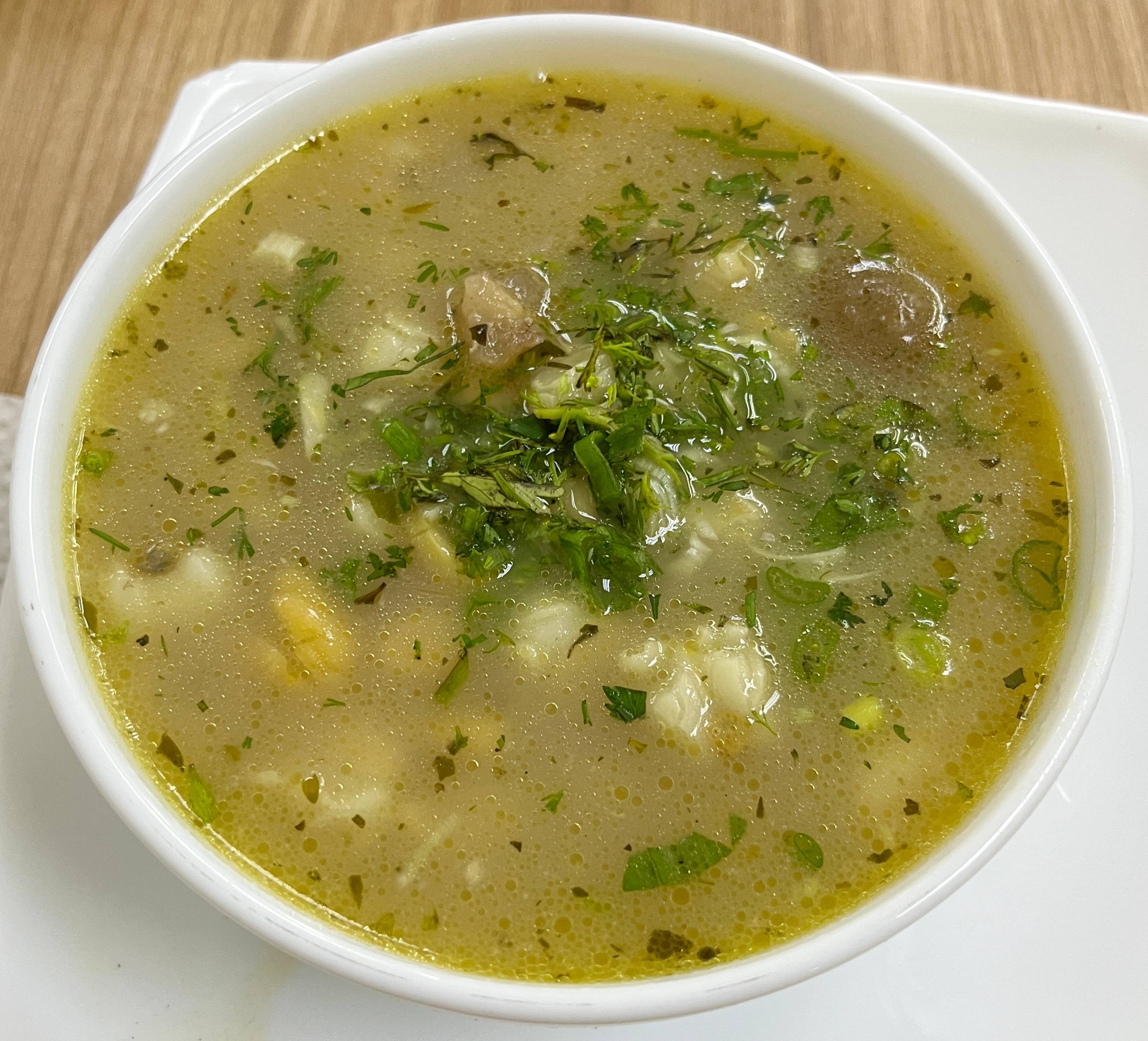 Caldo de patas, a local cow-foot soup, exactly the kind of dish to point at and order