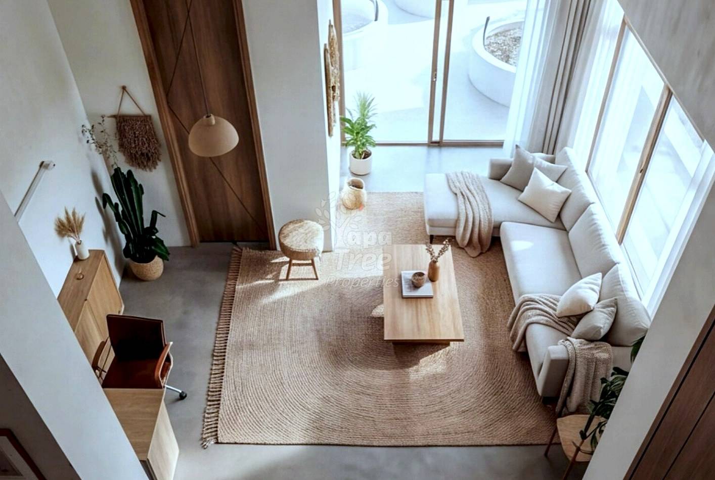 Render of a living room seen from above, with a linen sofa, timber coffee table and floor-to-ceiling windows
