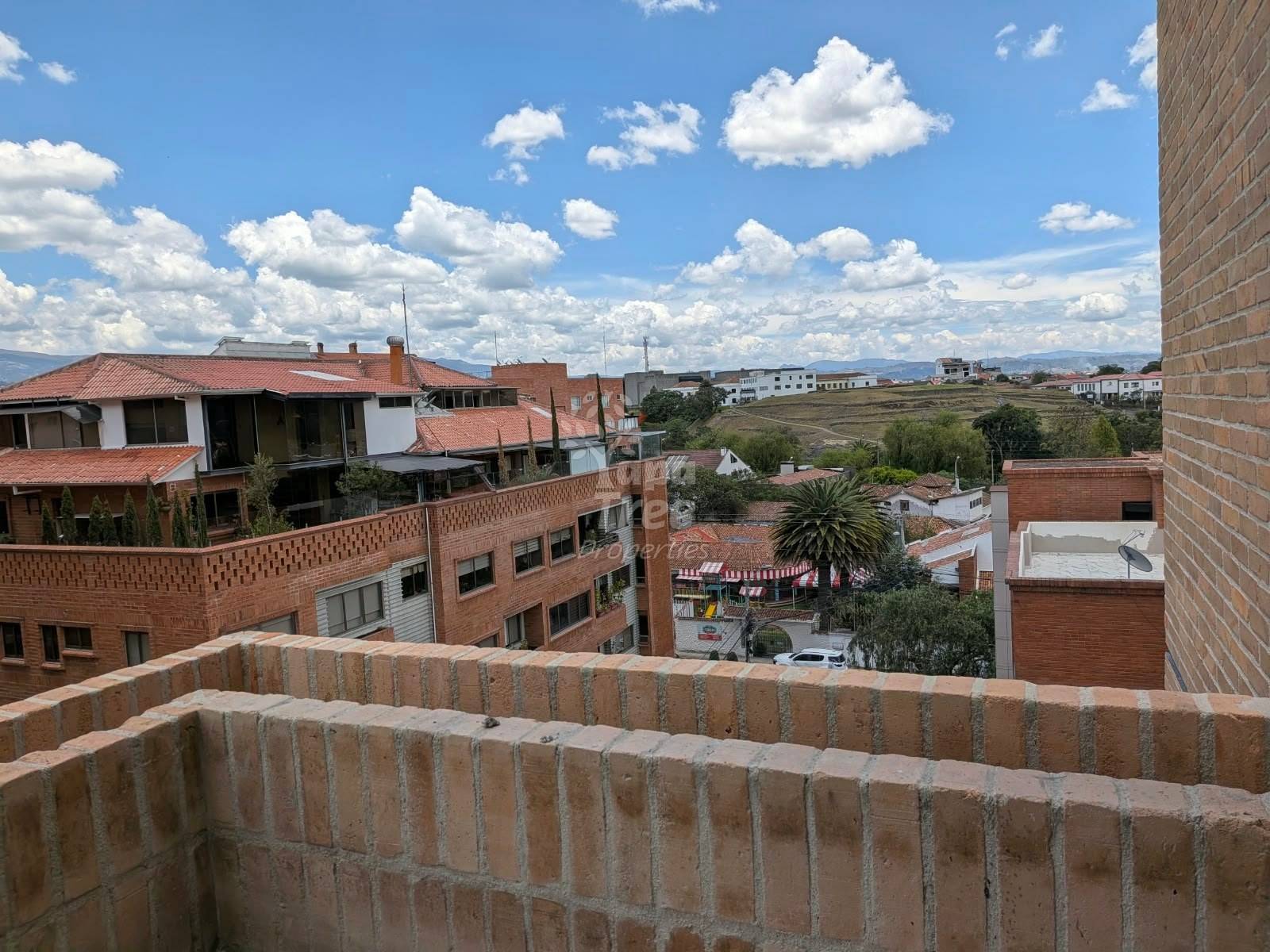 Real view from unit 502, fifth floor, photographed on site in October 2026 during construction