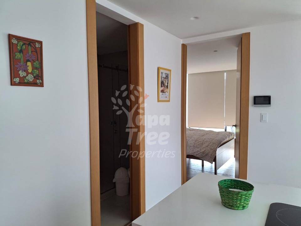 Bright 1-Bedroom Corner Suite with Private Terrace and Parking