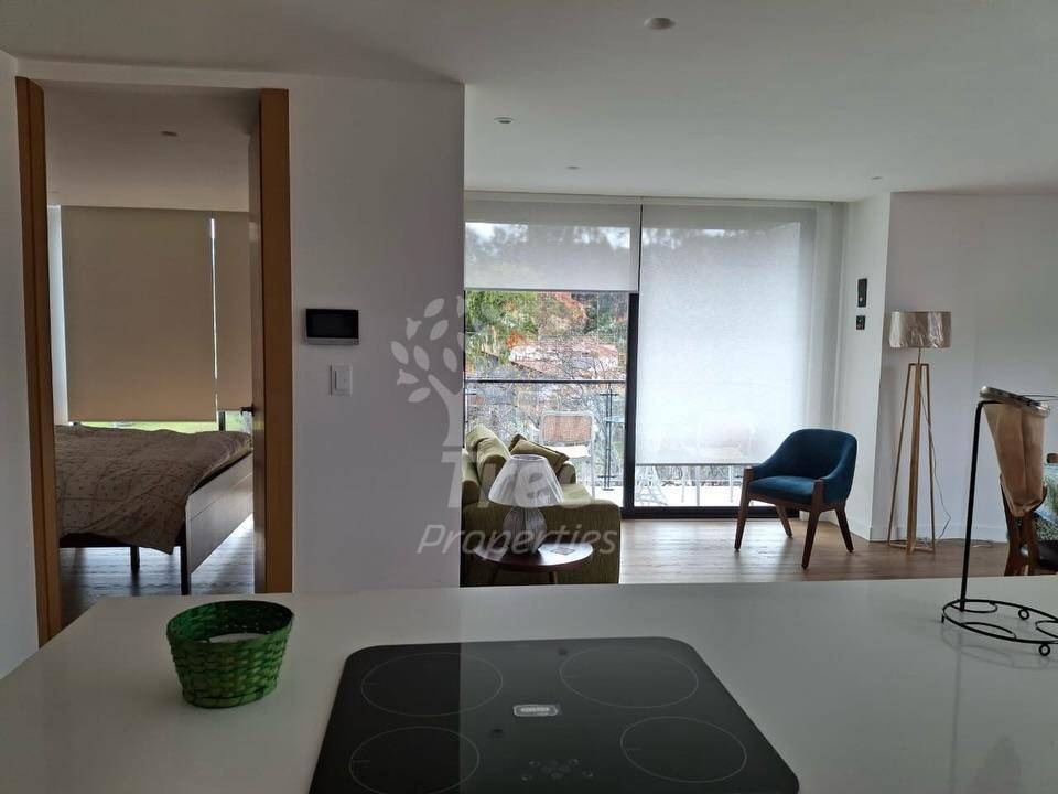 Bright 1-Bedroom Corner Suite with Private Terrace and Parking