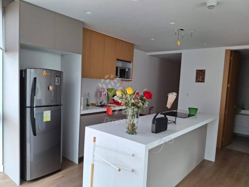Bright 1-Bedroom Corner Suite with Private Terrace and Parking