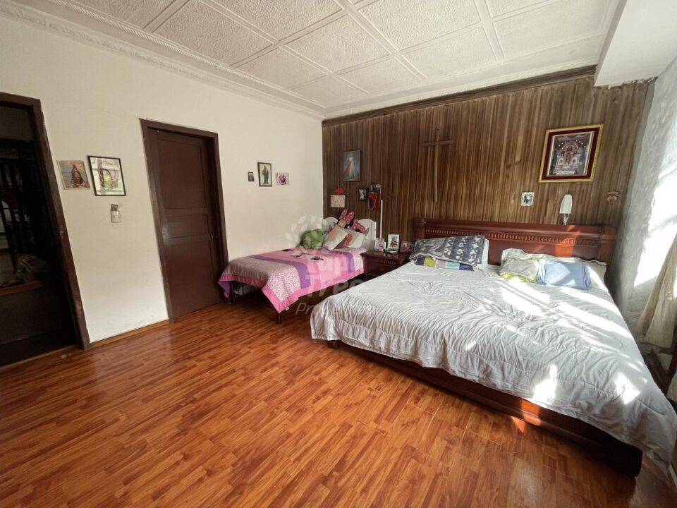 Fully Renovated 4-Bedroom House with Income-Generating Apartments and Commercial Space