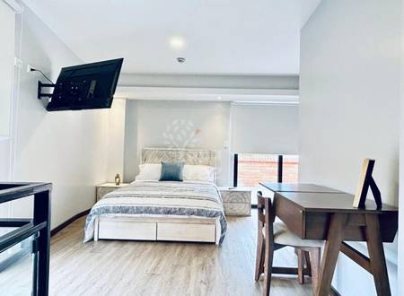 Modern 1-Bedroom Duplex Apartment with Private Balcony in Contemporary Building