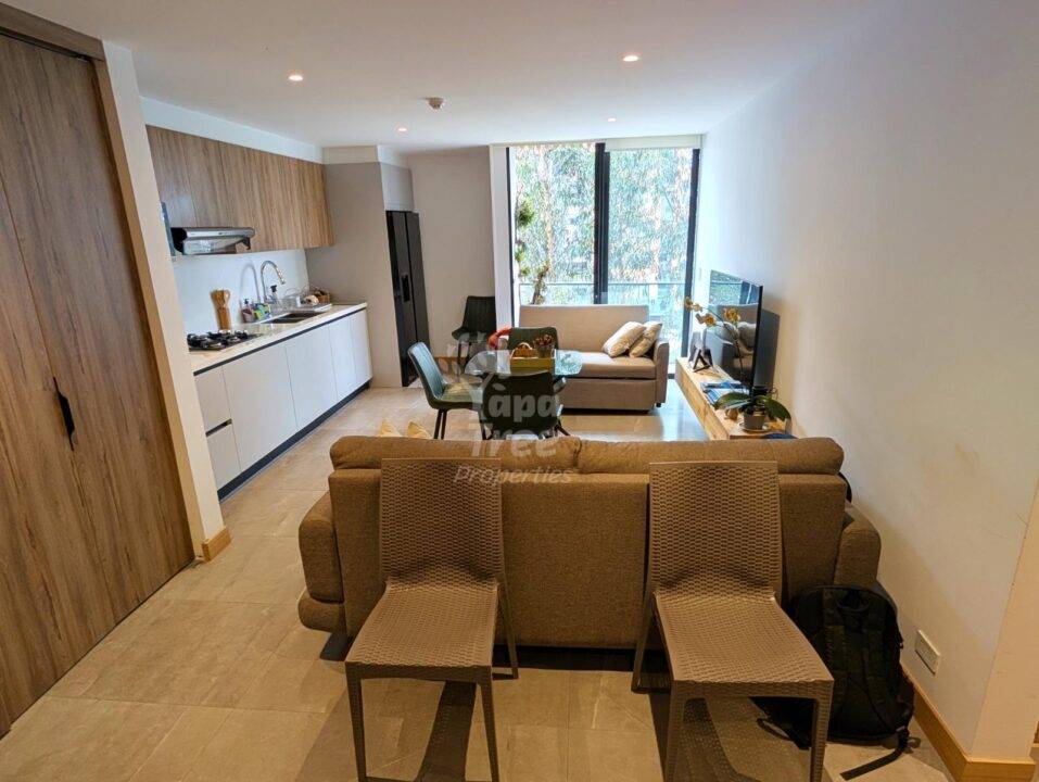 Modern 2-Bedroom Apartment with Balcony Overlooking Lush Greenery in Ordonez Lasso
