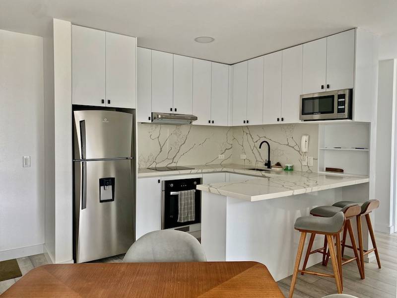 Modern 2-Bedroom Apartment with River Views and Terraces