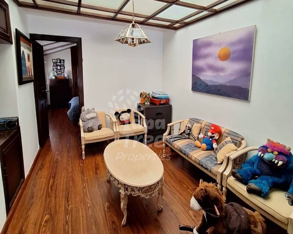 Spacious 3-Bedroom Home in Prime Remigio Crespo Location with Multiple Living Areas