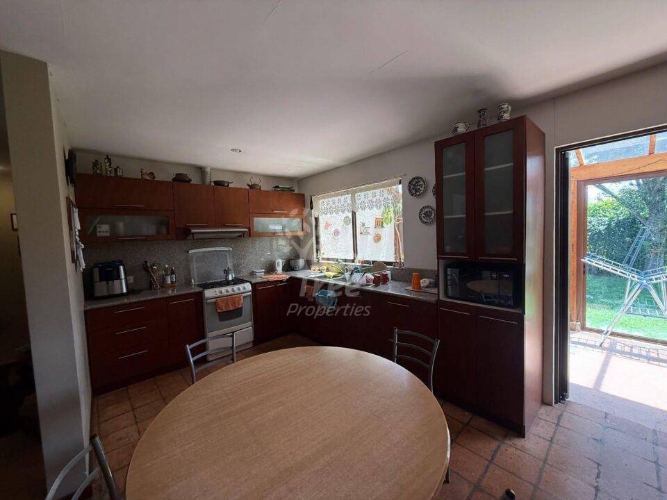 Spacious 5-Bedroom Home with Independent Suite in Exclusive San Joaquín Gated Community