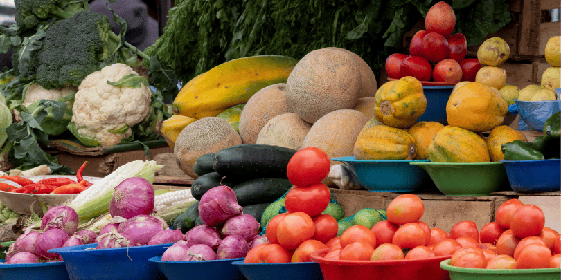 Buying fruits and vegetables at market